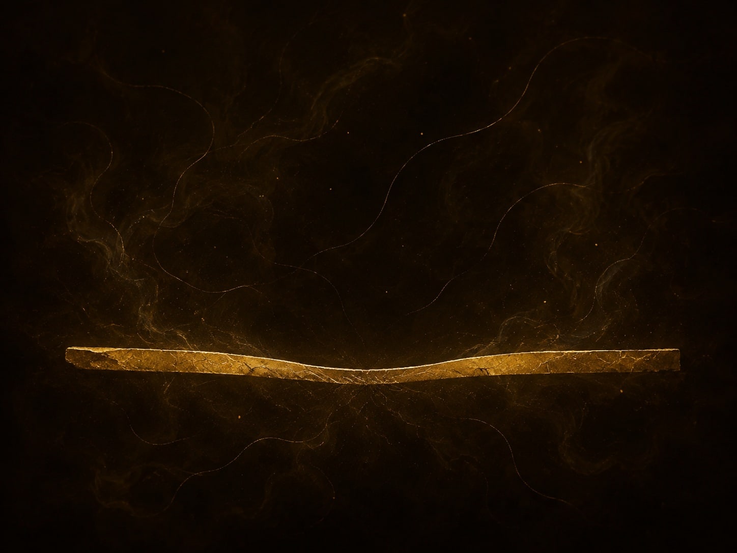 A thin uneven gold strip with a shallow hollow floats low in dark haze.