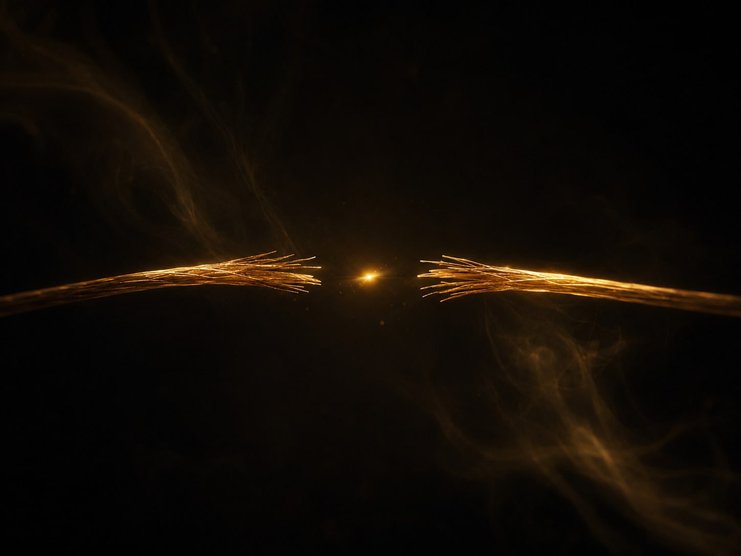 Two gold filament ends reaching toward each other with a single small spark arcing across the narrow gap between them.