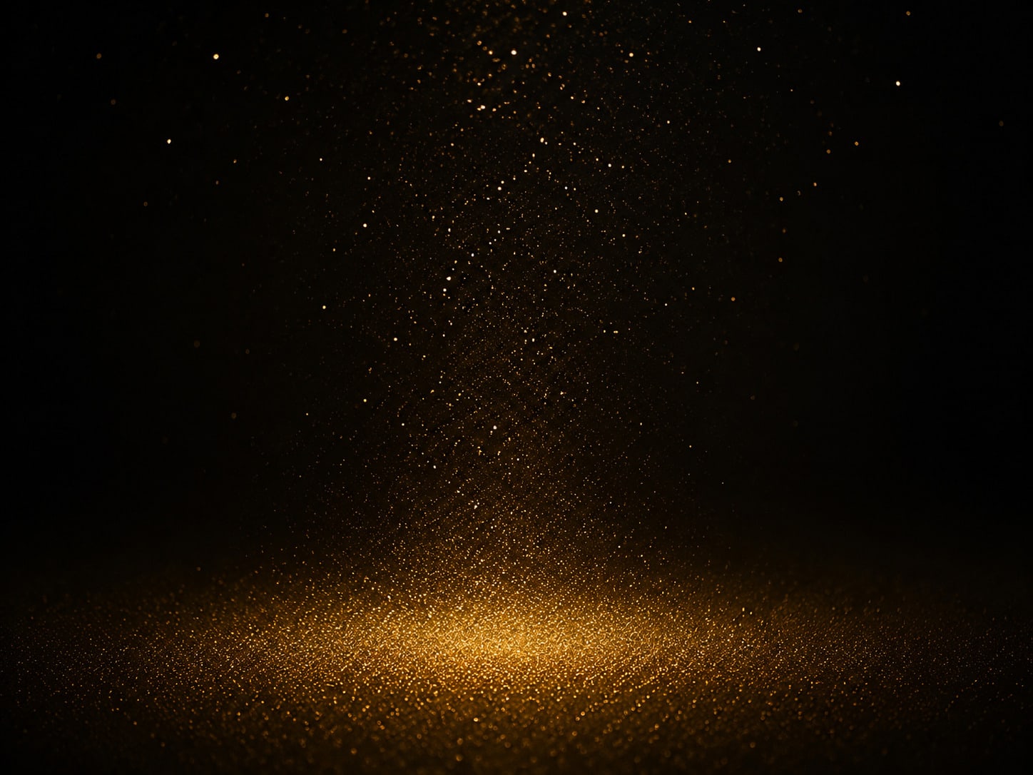 A drift of fine gold particles, scattered and uneven above and settling into an even calm below.